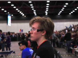 Person with short brown hair at an FRC Event